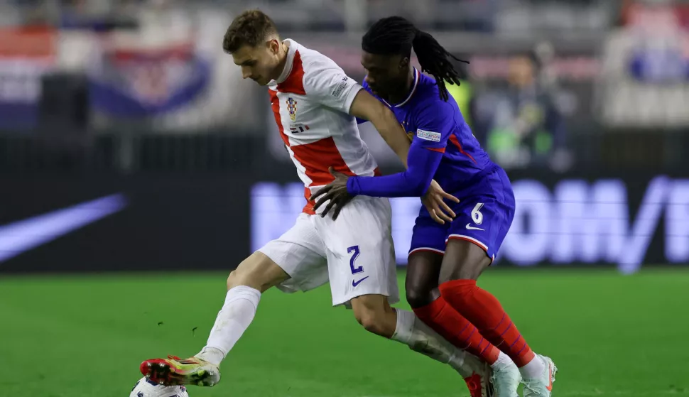 Split, 20.03.2025. - Prvi dvoboj ?etvrtfinala nogometne Lige nacija Hrvatska - Francuska. Na slici Josip Stani?i? i Eduardo Camavinga. foto HINA/ Damir SEN?AR/ ua