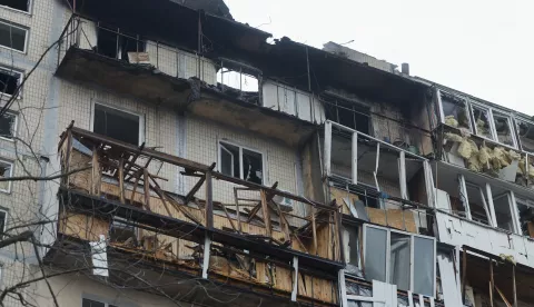 epa11982499 The site of the night drone attack on a nine-story residential building in Kyiv, Ukraine, 23 March 2025 amid the ongoing Russian invasion. At least three people were killed an another 8 were injured in an overnight Russian drone attack in Ukraine according to the Ukrainian army and the State Emergency Services. EPA/SERGEY DOLZHENKO