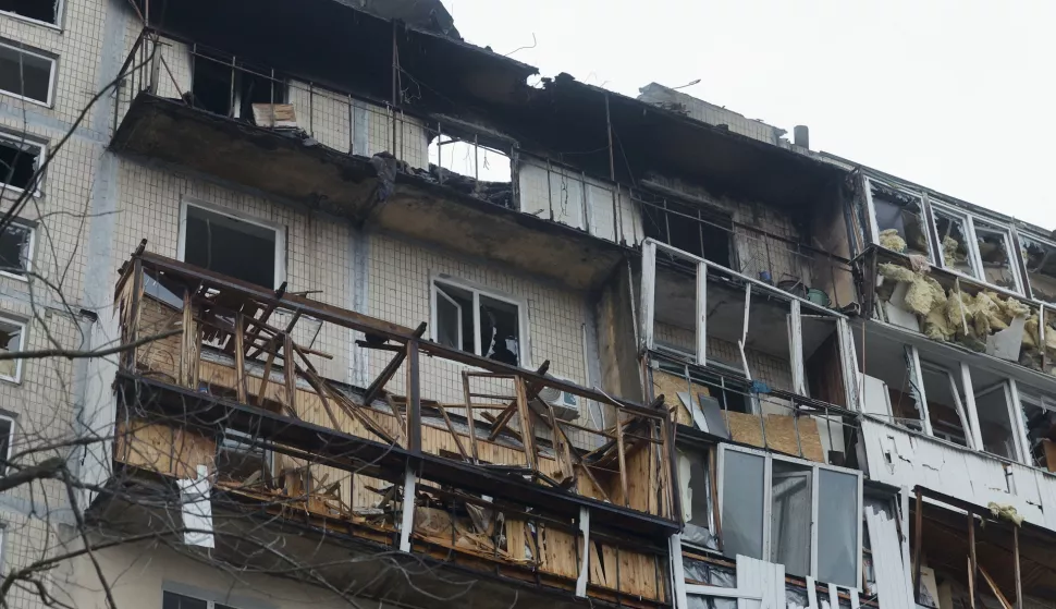 epa11982499 The site of the night drone attack on a nine-story residential building in Kyiv, Ukraine, 23 March 2025 amid the ongoing Russian invasion. At least three people were killed an another 8 were injured in an overnight Russian drone attack in Ukraine according to the Ukrainian army and the State Emergency Services. EPA/SERGEY DOLZHENKO