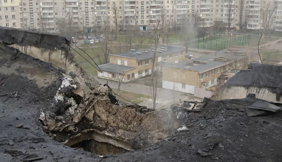 epa11982469 A view of the shelling at the site of an overnight drone attack on a nine-story residential building in Kyiv, Ukraine, 23 March 2025 amid the ongoing Russian invasion. At least three people were killed an another 8 were injured in an overnight Russian drone attack in Ukraine according to the Ukrainian army and the State Emergency Services. EPA/SERGEY DOLZHENKO