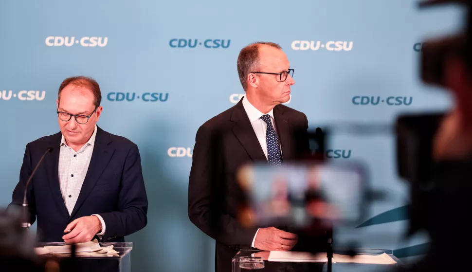 epa11963706 Christian Social Union (CSU) regional group chairman in the German parliament Bundestag, Alexander Dobrindt (L), stands next to Chairman of the Christian Democratic Union (CDU) party and faction Friedrich Merz (R) during a press statement after a parliamentary group meeting at the German parliament, Bundestag, in Berlin, Germany, 14 March 2025. EPA/HANNIBAL HANSCHKE