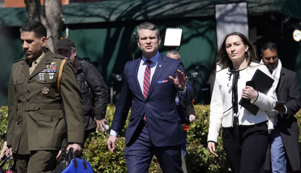 epa11979383 US Defense Secretary Pete Hegseth (C) walks back to the White House in Washington, DC, USA, 21 March 2025. Secretary Hegseth joined President Trump at the White House on 21 March to announce a defense program, which includes Boeing developing the F-47 next-generation fighter jet for the US Air Force. EPA/YURI GRIPAS/POOL