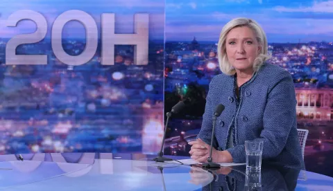epa12001926 President of the far-right Rassemblement National (RN) parliamentary group Marine Le Pen poses prior to an interview on the evening news broadcast of French TV channel TF1, in Boulogne-Billancourt, outside Paris, France, 31 March 2025. Le Pen was convicted of creating fake jobs at the EU parliament to channel funds to her party to employ people in France and was banned with immediate effect from standing for office for five years, throwing into doubt her bid to stand for the French Presidency in 2027. EPA/THOMAS SAMSON/POOL MAXPPP OUT