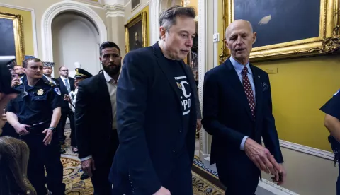 epa11942622 US Department of Government Efficiency's (DOGE) Elon Musk (C) arrives at the US Capitol for a closed-door meeting with Senate Republicans in Washington, DC, USA, 05 March 2025. Musks' appearance came shortly after the Supreme Court ruled that a lower court judge can order the Trump administration to pay out foreign aid. EPA/JIM LO SCALZO