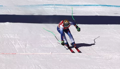 epa11818347 Federica Brignone of Italy crosses the finish line during the Women's Downhill race at the FIS Alpine Skiing World Cup in St. Anton, Austria, 11 January 2025. EPA/ANNA SZILAGYI