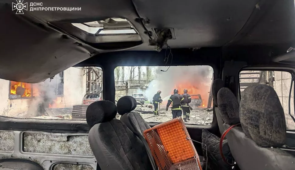 epa12005548 A handout photo released by the press service of the State Emergency Service (SES) of Ukraine shows Ukrainian rescuers working at the site of a rocket strike in Kryvyi Rih, central Ukraine, 02 April 2025, amid the Russian invasion. At least four people have been killed and 14 others injured after Russian shelling hit Kryvyi Rih, the Dnipropetrovsk Regional Military Administration reported. EPA/STATE EMERGENCY SERVICE OF UKRAINE HANDOUT -- BEST QUALITY AVAILABLE -- MANDATORY CREDIT: STATE EMERGENCY SERVICE OF UKRAINE -- HANDOUT EDITORIAL USE ONLY/NO SALES