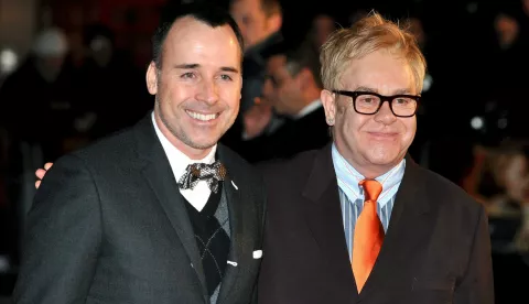 epa01573850 British singer Elton John (R) arrives with partner David Furnish (L) at the UK premiere of Baz Luhrmann's film, Australia, held a the Odeon Leicester Square in Central London, Britain on 10 December 2008. Australia is the story of Lady Sarah Ashley, an English aristocratic woman who leaves England to follow her husband to Australia. He is in Australia with the intention of selling his cattle station, however, Lady Ashley believes he is having an affair and travels out there to confront him. EPA/DANIEL DEME