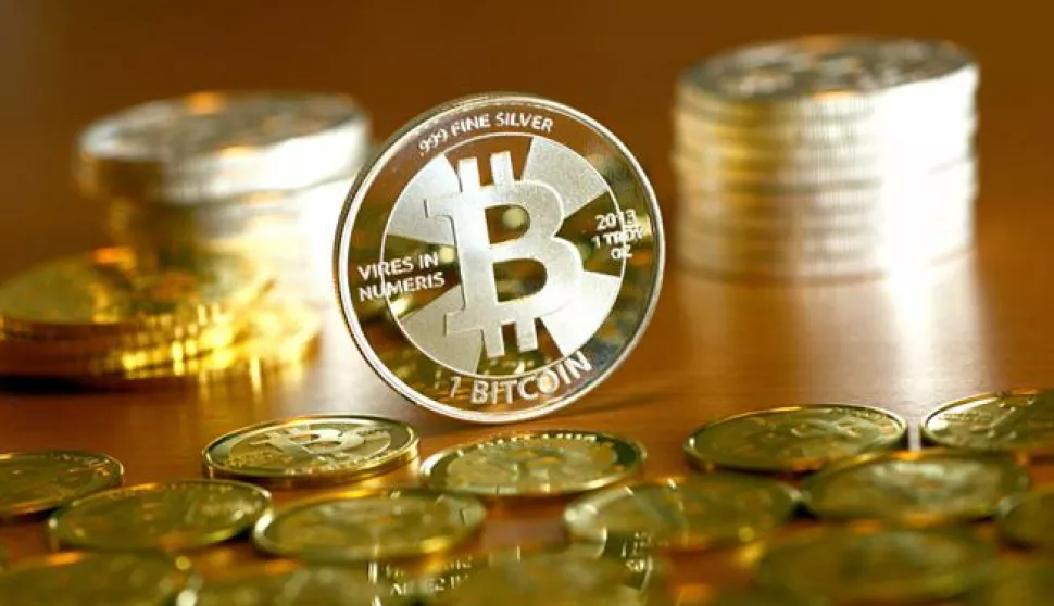 File - Illustration - A file photo dated 28 November 2013 shows Bitcoin coins pictured at the coin dealer BitcoinCommodities in Berlin, Germany. The Chinese government continues to act against the digital currency. Photo:?Jens Kalaene/dpa | usage worldwide/DPA/PIXSELL------2xcolor osijek