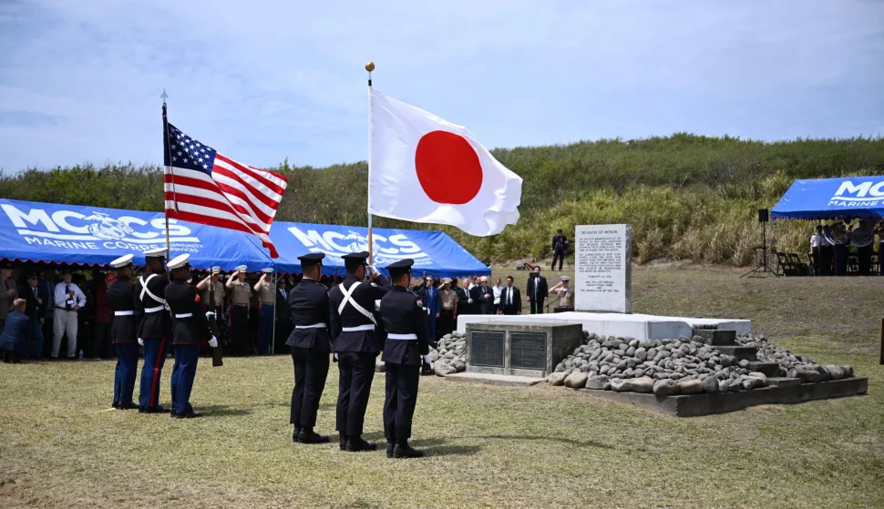 epa11996466 The US and the Japanese flags during a joint Japan-US memorial ceremony for the 80th anniversary of the Battle of Iwo Jima, at Iwo Jima island, Japan, 29 March 2025. Japanese Prime Minister Shigeru Ishiba and US Defense Secretary Pete Hegseth called for a stronger alliance between the two countries at a ceremony marking the 80th anniversary of the Battle of Iwo Jima during World War II. EPA/JAPAN POOL VIA JIJI PRESS JAPAN OUT EDITORIAL USE ONLY
