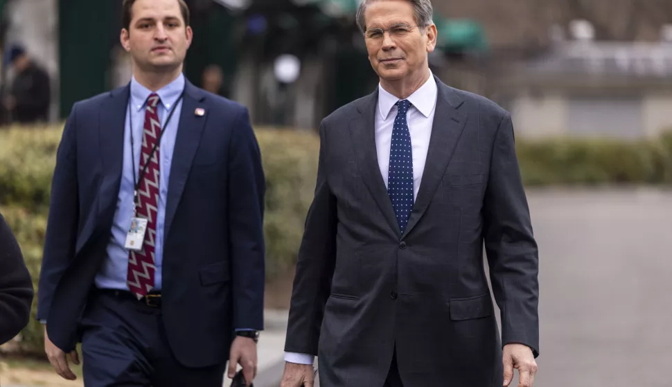 epa11963900 US Secretary of Treasury Scott Bessent (R) walks to the West Wing following a television interview outside of the White House in Washington, DC, USA, 14 March 2025. Secretary Bessent said that the US would undergo a transition period as the federal government tries to cut spending. EPA/SHAWN THEW