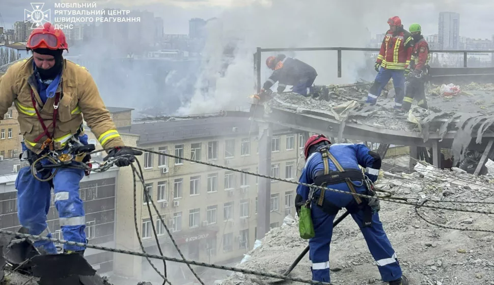 epa12013365 A handout picture made available by the State Emergency Service shows Ukrainian rescuers working at the site of a rocket strike in Kyiv, Ukraine, 06 April 2025, amid the ongoing Russian invasion. At least one person died and three other people were injured after an overnight combined rocket and shock drone attacks in Kyiv, according to the State Emergency Service report. Russian troops entered Ukrainian territory on 24 February 2022, starting a conflict that has provoked destruction and a humanitarian crisis. EPA/STATE EMERGENCY SERVICE HANDOUT HANDOUT HANDOUT EDITORIAL USE ONLY/NO SALES