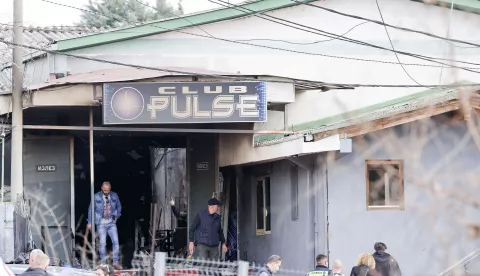 epa11967812 Investigators enter the 'Club Pulse' nightclub after a fire in Kocani, Republic of North Macedonia, 16 March 2025. A fire at a discotheque in Kocani in the early hours of 16 March 2025 claimed the lives of at least 50 people and left over 100 injured, according to initial reports from the Directorate for Protection and Rescue and the Center for Crisis Management. EPA/GEORGI LICOVSKI