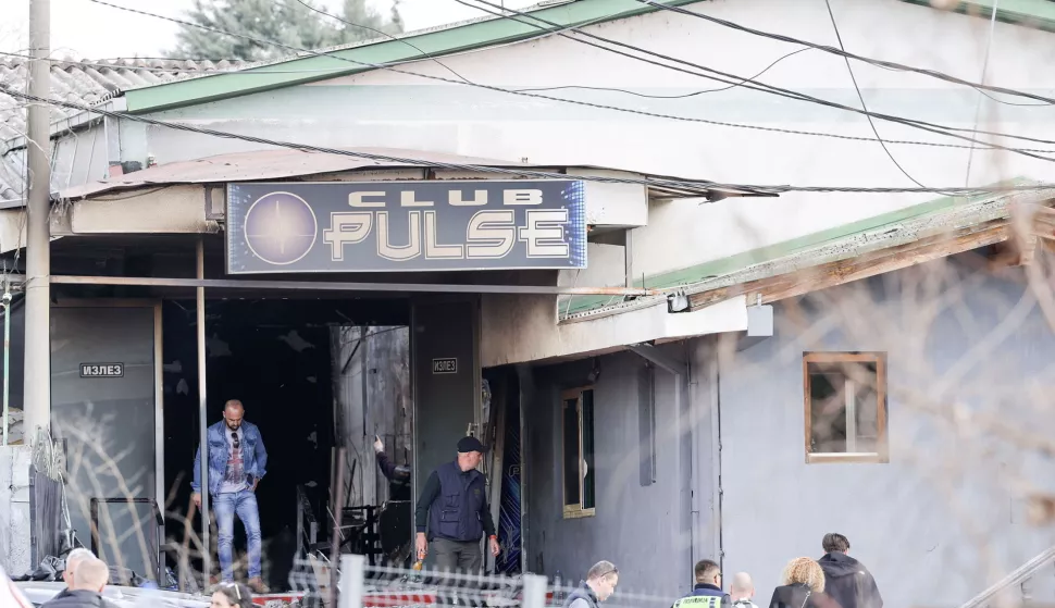 epa11967812 Investigators enter the 'Club Pulse' nightclub after a fire in Kocani, Republic of North Macedonia, 16 March 2025. A fire at a discotheque in Kocani in the early hours of 16 March 2025 claimed the lives of at least 50 people and left over 100 injured, according to initial reports from the Directorate for Protection and Rescue and the Center for Crisis Management. EPA/GEORGI LICOVSKI
