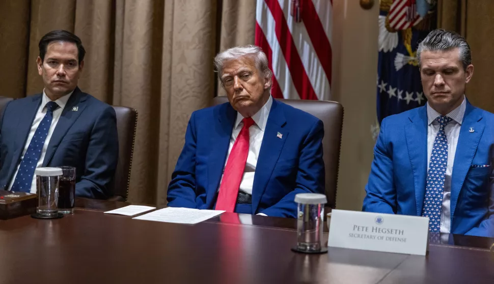 epa12023357 US President Donald J. Trump (C), with Secretary of State Marco Rubio (L) and Secretary of Defense Pete Hegseth (R), listens to remarks during a Cabinet meeting in the Cabinet Room of the White House in Washington, DC, USA, 10 April 2025. EPA/SHAWN THEW/POOL