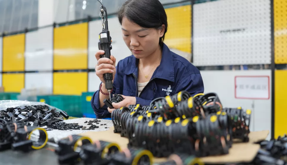epa12022998 A staff member works at a workshop of a precision machinery manufacturing company in Beilun District of Ningbo City, east China's Zhejiang Province, 10 April 2025. In recent years, Beilun District has tailored its development plans for key industrial chains, continuously enhancing the level of digital transformation among enterprises in the region, aiming to develop a number of advantageous industrial clusters and leading enterprises. In 2024, the total output value of industrial enterprises above designated size in Beilun District achieved 585.727 billion yuan (about 80.1 billion US dollar), marking a year on year increase of 9.6 percent. EPA/XINHUA/HUANG ZONGZHI CHINA OUT/UK AND IRELAND OUT/ MANDATORY CREDIT EDITORIAL USE ONLY