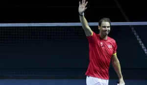 epa11730106 Rafa Nadal of Spain waves during a tribute received after the Spanish doubles match against the Netherlands during the Davis Cup quarterfinal between Netherlands and Spain at the Jose Maria Martin Carpena Sports Palace in Malaga, Spain, 19 November 2024. EPA/JORGE ZAPATA