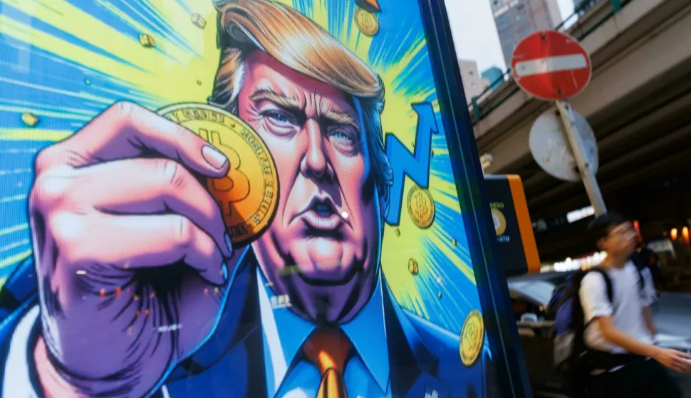 People walks past an advertisement feature Donald Trump with Bitcoin in Hong Kong on Sunday, April 6, 2025. Photo/May JamesU.S. reciprocal tariffs sent shockwaves to global financial markets, with cryptocurrencies also experiencing declines. Bitcoin, the world's largest cryptocurrency by market value, fell more than 5% to $78,892.92 at 1855 GMT on Sunday (Photo by May James/SOPA Images/Sipa USA) Photo: SOPA Images/SIPA USA