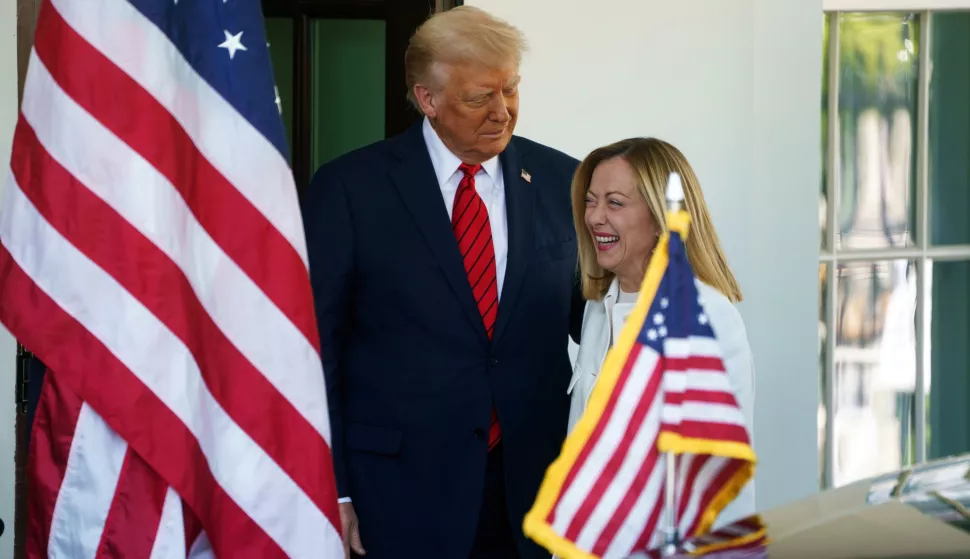 epa12037064 US President Donald Trump (L) greets Italian Prime Minister Giorgia Meloni (R) at the White House, Washington, DC, USA, 17 April 2025. EPA/WILL OLIVER