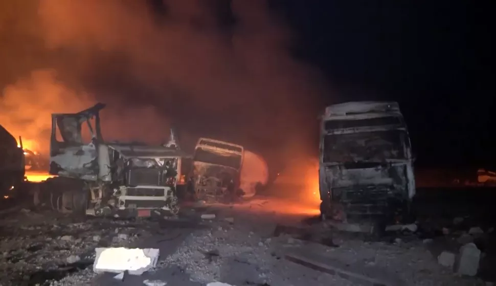 epa12038083 A handout screen grab taken from a video released by Houthis-run al-Masirah TV shows flames and smoke rising from the fuel port of Ras Isa following US airstrikes, in the port province of Hodeidah, Yemen, 18 April 2025. At least 22 people were killed and more than 50 others injured as a result of US airstrikes that targeted the fuel port of Ras Isa on the coast of the Red Sea, in the Yemeni province of Hodeidah, Houthis-run al-Masirah TV has reported. EPA/HOUTHIS AL-MASIRSAH TV/HANDOUT BEST QUALITY AVAILABLEHANDOUT EDITORIAL USE ONLY/NO SALES