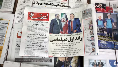 epa12026571 A copy of Iranian daily newspaper Etemad entitled 'First round of Diplomacy' carrying a picture of Iranian Foreign Minister Abbas Araghchi and US Special Envoy to the Middle East, Steve Witkoff, in a kiosk in Tehran, Iran, 12 April 2025. Top Iranian and US officials will hold indirect negotiations in Oman on 12 April amid the ongoing tensions between the USA, Israel and Iran. EPA/ABEDIN TAHERKENAREH