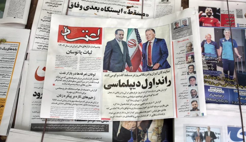 epa12026571 A copy of Iranian daily newspaper Etemad entitled 'First round of Diplomacy' carrying a picture of Iranian Foreign Minister Abbas Araghchi and US Special Envoy to the Middle East, Steve Witkoff, in a kiosk in Tehran, Iran, 12 April 2025. Top Iranian and US officials will hold indirect negotiations in Oman on 12 April amid the ongoing tensions between the USA, Israel and Iran. EPA/ABEDIN TAHERKENAREH