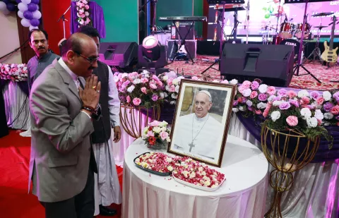epa12044411 People attend an inter faith memorial meeting to mourn the death of Pope Francis in New Delhi, India, 21 April 2025. Pope Francis died on 21 April 2025 at the age of 88, according to the Holy See. Born Jorge Mario Bergoglio in Buenos Aires, Argentina, on 17 December 1936, he was appointed leader of the Catholic Church on 13 March 2013, succeeding Pontiff Emeritus Benedict XVI. EPA/RAJAT GUPTA
