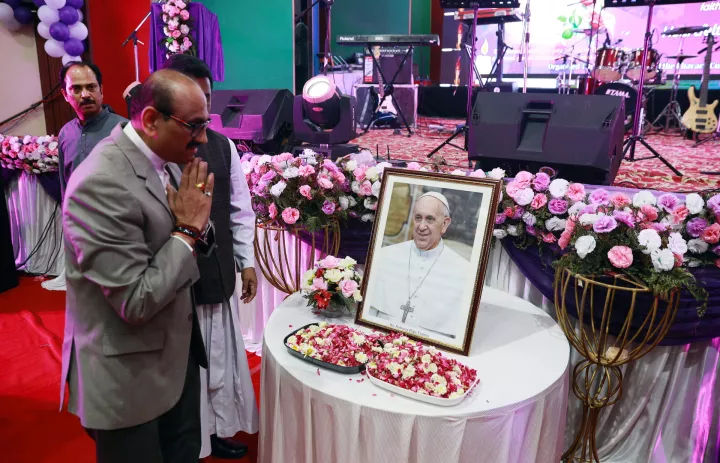 epa12044411 People attend an inter faith memorial meeting to mourn the death of Pope Francis in New Delhi, India, 21 April 2025. Pope Francis died on 21 April 2025 at the age of 88, according to the Holy See. Born Jorge Mario Bergoglio in Buenos Aires, Argentina, on 17 December 1936, he was appointed leader of the Catholic Church on 13 March 2013, succeeding Pontiff Emeritus Benedict XVI. EPA/RAJAT GUPTA