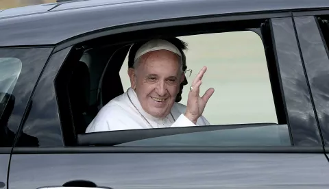 His Holiness Pope Francis is being transported to Washington D.C in a Fiat 500 at Joint Base Andrews in Maryland on September 22, 2015. The Pope is making his first trip to the United States on a three-city, five-day tour that will include Washington, D.C., New York City and Philadelphia. Credit: Olivier Douliery/Pool via CNP Photo via Newscom Photo: Olivier Douliery/NEWSCOM