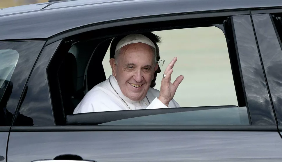 His Holiness Pope Francis is being transported to Washington D.C in a Fiat 500 at Joint Base Andrews in Maryland on September 22, 2015. The Pope is making his first trip to the United States on a three-city, five-day tour that will include Washington, D.C., New York City and Philadelphia. Credit: Olivier Douliery/Pool via CNP Photo via Newscom Photo: Olivier Douliery/NEWSCOM