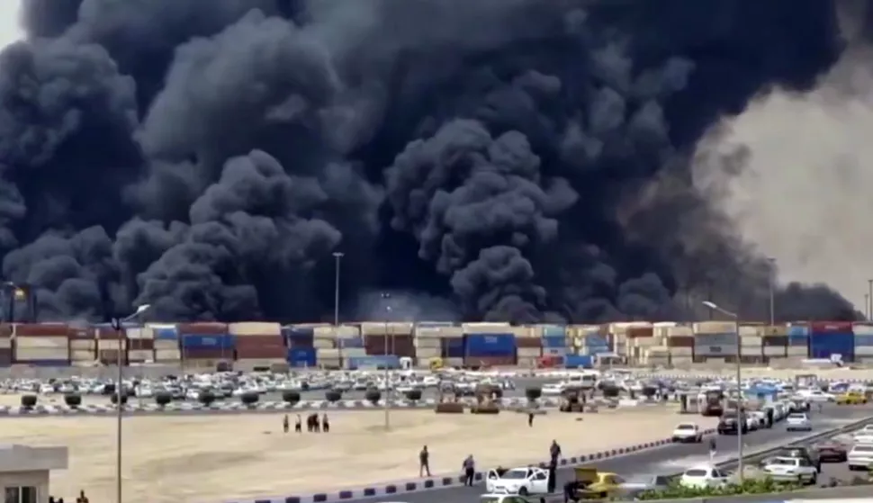 epa12056207 A video grab made available by the official website of Iranian state TV Islamic Republic of Iran Broadcasting (IRIB) shows smoke rising at Rajaie port, in city of Bandar Abbas, southern Iran, 26 April 2025. Iranian state media reported several injuries in an explosion at the port, but authorities have not yet announced the cause. EPA/IRIB HANDOUT -- MANDATORY CREDIT -- BEST QUALITY AVAILABLE -- HANDOUT EDITORIAL USE ONLY/NO SALES