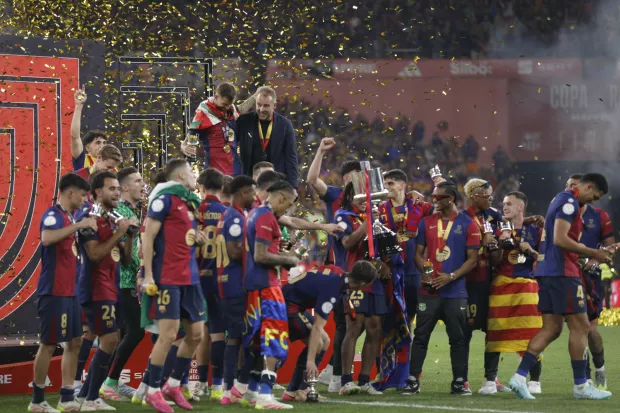 FC Barcelona players celebrating the victory with the trophy during the Copa del Rey match, Final, between FC Barcelona and Real Madrid CF played at La Cartuja Stadium on April 26, 2025 in Sevilla, Spain. (Photo by Antonio Pozo/Pressinphoto)
