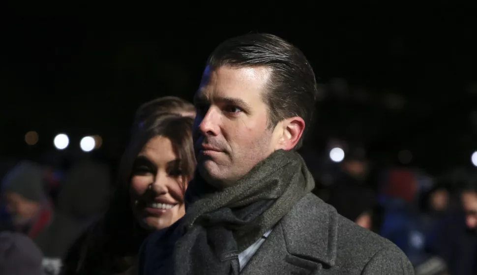 epa07196713 Donald Trump Jr. (R) with his girlfriend Kimberly Guilfoyle (L) attend the 2018 National Christmas Tree Lighting Ceremony at the Ellipse, near the White House in Washington, DC, USA, 28 November 2018. This is the 96th annual lighting ceremony. EPA/OLIVER CONTRERAS/POOL