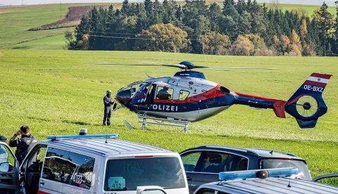 epa11688893 A police helicopter is dispatched as part of the search for a suspect after a shooting incident in Kirchberg ob der Donau, Austria, 28 October 2024. Police in Kirchberg ob der Donau in the northern Austrian state of Upper Austria have been conducting a major operation since the morning of 28 October 2024. A spokeswoman for the state police confirmed that a man is suspected of having shot dead two people, including the mayor of Kirchberg. The suspect is still on the run. EPA/ANTONIO BAYER