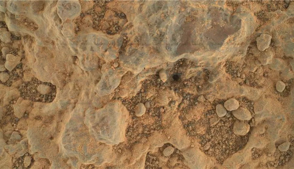 epa09356381 A handout picture made available by the National Aeronautics and Space Administration (NASA) shows a close-up view of a rock target nicknamed 'Foux', taken by NASA's Perseverance Mars rover using its WATSON (Wide Angle Topographic Sensor for Operations and eNgineering) camera, part of the SHERLOC instrument on the end of the rover's robotic arm, on Mars, 11 July 2021 (issued 21 July 2021), on the 139th Martian day, or sol, of the mission. The area within the camera is roughly 3.5 cm by 2.6 cm. A key objective for Perseverance's mission on Mars is astrobiology, including the search for signs of ancient microbial life. The rover will characterize the planet's geology and past climate, pave the way for human exploration of the Red Planet, and be the first mission to collect and cache Martian rock and regolith (broken rock and dust). EPA/NASA/JPL-Caltech/MSSS HANDOUT HANDOUT EDITORIAL USE ONLY/NO SALES