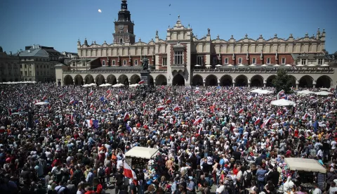 epa10672138 Supporters and members of opposition parties take part in a 'Freedom March' protest against government's policies at the Main Market Square in Krakow, Poland, 04 June 2023. The opposition march, on the 34th anniversary of the first partial-free elections in Poland on 04 June 1989, is to protest against Polish government policies. EPA/LUKASZ GAGULSKI POLAND OUT