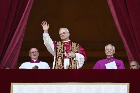 epa12084350 A handout picture provided by the Vatican Media shows newly elected Pope Leo XIV, Cardinal Robert Francis Prevost from the USA, addressing faithfuls from the central loggia of Saint Peter's Basilica, Vatican City, 08 May 2025. EPA/VATICAN MEDIA HANDOUT HANDOUT EDITORIAL USE ONLY/NO SALES