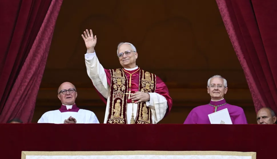 epa12084350 A handout picture provided by the Vatican Media shows newly elected Pope Leo XIV, Cardinal Robert Francis Prevost from the USA, addressing faithfuls from the central loggia of Saint Peter's Basilica, Vatican City, 08 May 2025. EPA/VATICAN MEDIA HANDOUT HANDOUT EDITORIAL USE ONLY/NO SALES