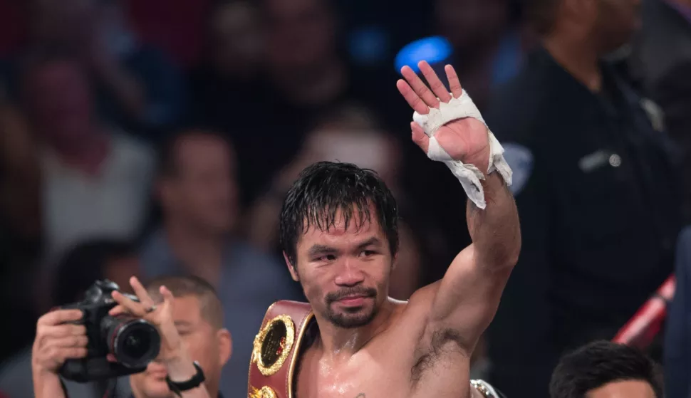 (SP)US-LAS VEGAS-WBO-WELTERWEIGHT-TITLE (161106) -- LAS VEGAS, Nov. 6, 2016 (Xinhua) -- Manny Pacquiao of the Philippines celebrates after defeating Jessie Vargas in their WBO welterweight title boxing match in Las Vegas, the United States, Nov. 5, 2016. (Xinhua/Yang Lei) Yang Lei Photo: XINHUA/PIXSELL
