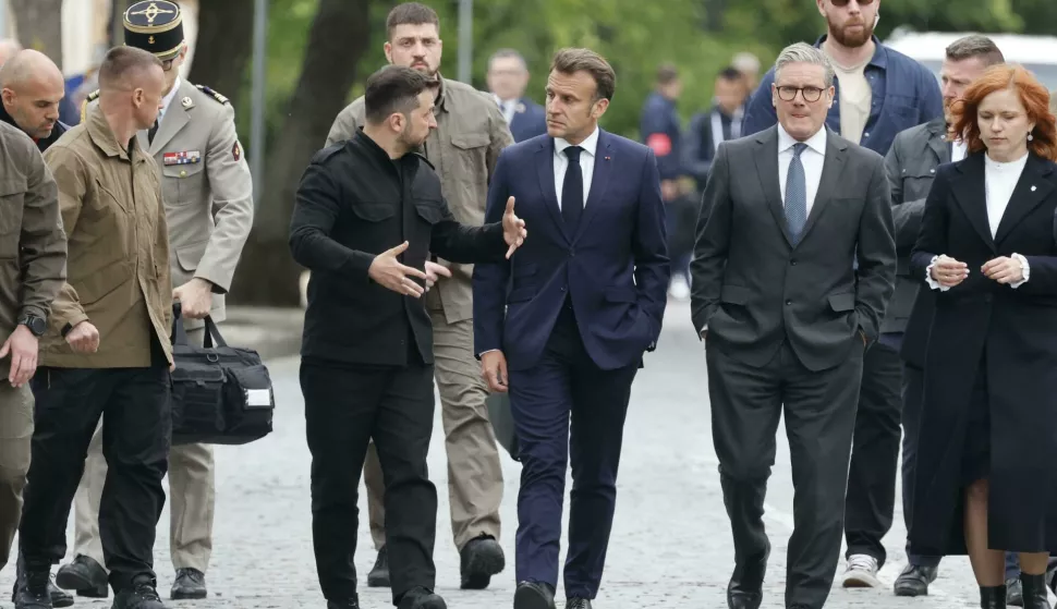 Britain's Prime Minister Keir Starmer (2ndR), France's President Emmanuel Macron (C) and Ukraine's President Volodymyr Zelensky (4thL) arrive to visit the Wall of Heroes of the Nation, a memorial wall of fallen Ukrainian servicemen, in Kyiv on May 10, 2025, after a meeting of European leaders in the Ukrainian capital, amid the Russian invasion of Ukraine. Kyiv's allies pressed Russia on May 10 to accept a 30-day unconditional ceasefire in Ukraine from May 12, 2025 threatening Moscow with coordinated sanctions if it did not agree to the demand. The ultimatum came during a joint press conference in Kyiv attended by Ukrainian President Volodymyr Zelensky and the leaders of France, Germany, the UK and Poland. Photo by Ludovic Marin/Pool/ABACAPRESS.COM Photo: Marin Ludovic/Pool/ABACA/ABACA