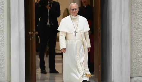 epa12093320 Pope Leo XIV arrives for an audience with members of the media at the Paul VI Audience Hall in Vatican City, 12 May 2025. EPA/ETTORE FERRARI
