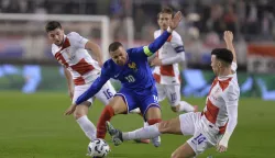 Split, 20.03.2025. - Prvi dvoboj ?etvrtfinala nogometne Lige nacija Hrvatska - Francuska. Na slici Martin Baturina, Kylian Mbappe i Ivan Peri?i?. foto HINA/ Mario STRMOTI?/ ua