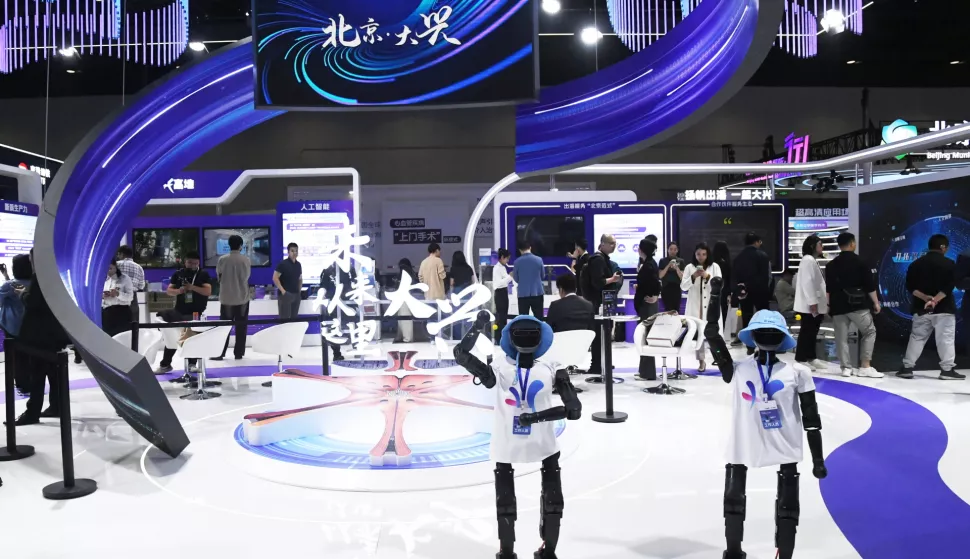 epa12083072 Robots wave to audiences during the 27th China Beijing International High-tech Expo in Beijing, China, 08 May 2025. The expo, which opened on 08 May, will last until 11 May. Boasting an exhibition area of about 50,000 square meters, the event has attracted more than 800 exhibitors from home and abroad. EPA/XINHUA/REN CHAO CHINA OUT/UK AND IRELAND OUT/  MANDATORY CREDIT EDITORIAL USE ONLY