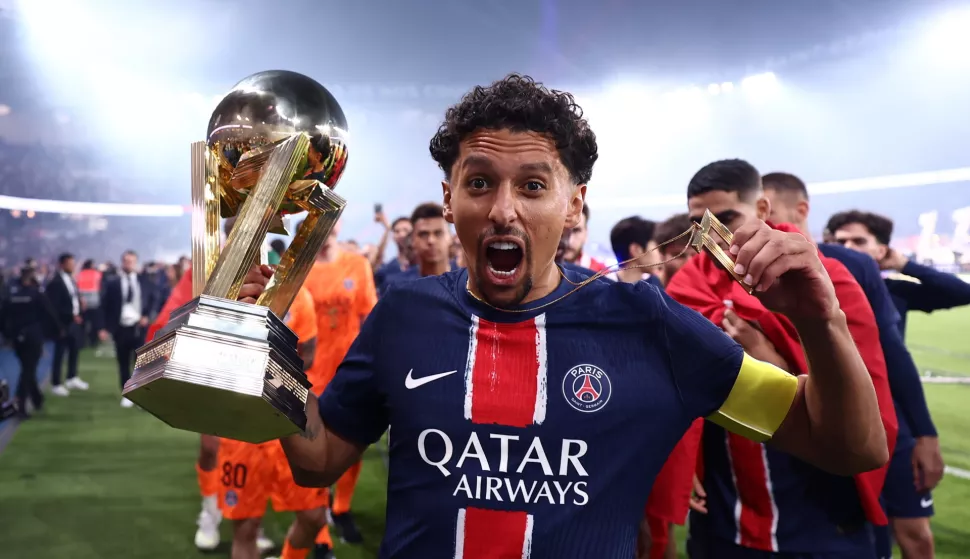epa12111258 Paris Saint-Germain's Marquinhos celebrates with the trophy the team's championship title after the French Ligue 1 soccer match between Paris Saint-Germain and AJ Auxerre in Paris, France, 17 May 2025. EPA/FRANCK FIFE/POOL MAXPPP OUT