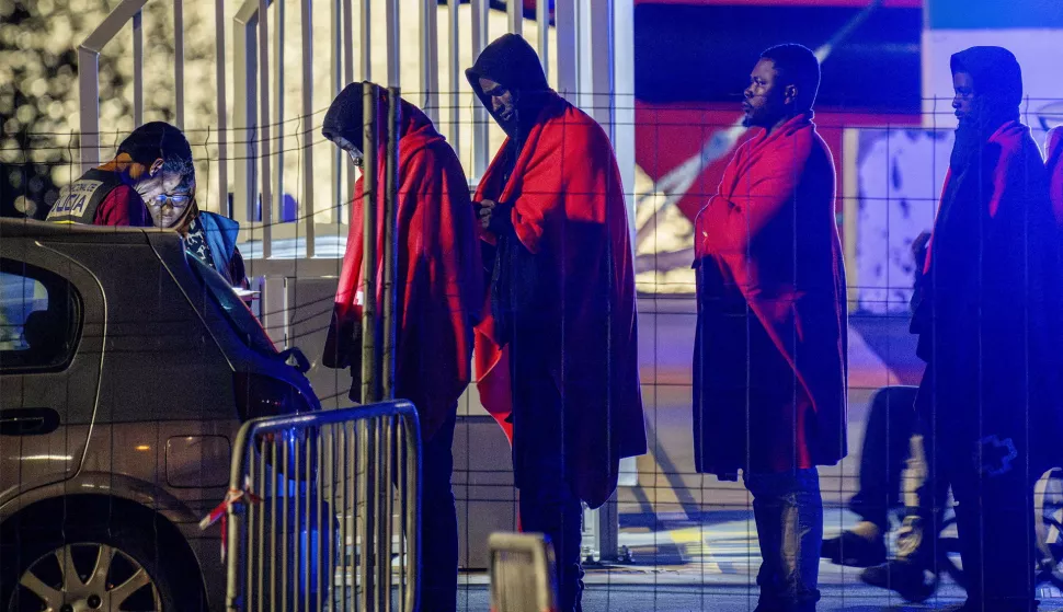 epa12082527 Migrants arrive at Arricife dock, in Lanzarote, Canary Islands, Spain, 08 May 2025, after they were rescued by Red Cross and Save Navy members when they tried to arrive in Spain in a small boat. EPA/ADRIEL PERDOMO