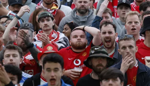epa12123945 Supporters of Manchester United attend the match at Etxebarria Park during the UEFA Europa League final soccer match between Tottenham Hotspur and Manchester United, in Bilbao, Spain, 21 May 2025. EPA/JUAN HERRERO