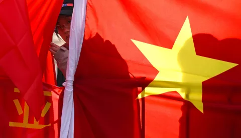epa11416741 A protester attends a rally ahead of the visit by Chinese Premier Li Qiang to the Australian Parliament House in Canberra, Australia, 17 June 2024. Li Qiang, who is second only to President Xi Jinping, is on a four-day visit to Australia. EPA/LUKAS COCH AUSTRALIA AND NEW ZEALAND OUT