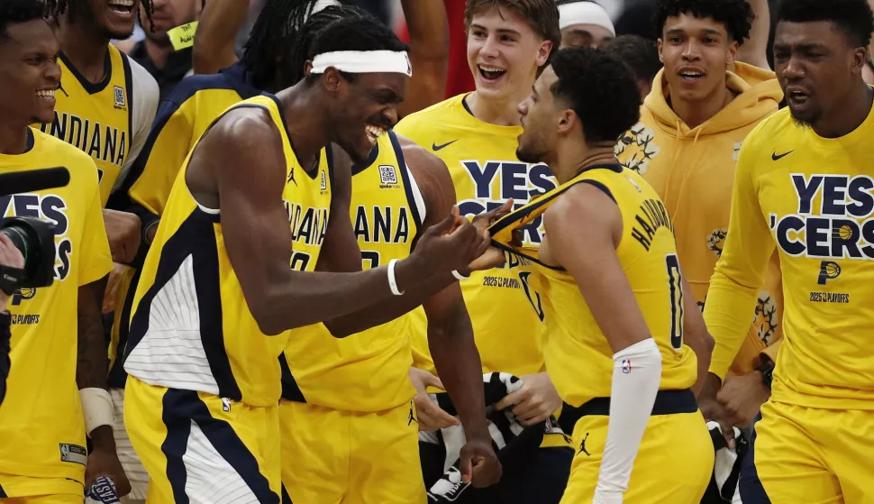 epaselect epa12079062 Indiana Pacers guard Tyrese Haliburton (2-R) and Indiana Pacers forward Pascal Siakam of Cameroon (2-L) celebrate as they are surrounded by teammates after Haliburton made the game winning 3 point shot as time ran out during the second half of the NBA Playoffs Eastern Conference Semifinals game two between the Indiana Pacers and the Cleveland Cavaliers in Cleveland, Ohio, USA, 06 May 2025. EPA/DAVID MAXWELL SHUTTERSTOCK OUT