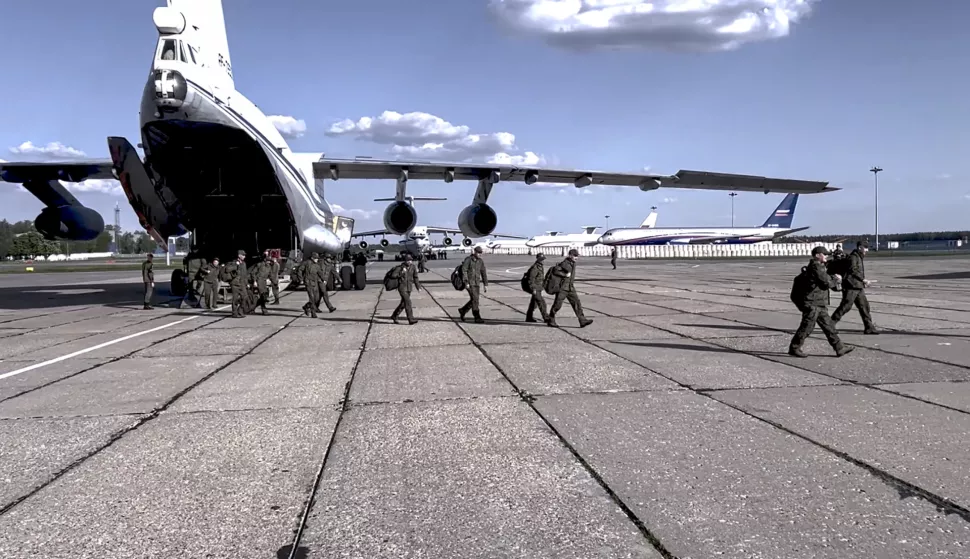 epa12134945 A still image taken from a handout video provided by the press service of the Russian Ministry of Defence shows Russian prisoners of war (POWs) after landing at Chkalovsky air base following a prisoner swap, in Shchyolkovo, Moscow region, Russia, 25 May 2025. In the final stage of the '1000-for-1000' exchange agreement, 303 Russian servicemen were returned to Russia. The agreement was reached after recent Russia-Ukraine talks held in Turkey. EPA/RUSSIAN DEFENCE MINISTRY PRESS SERVICE/HANDOUT HANDOUT EDITORIAL USE ONLY/NO SALES