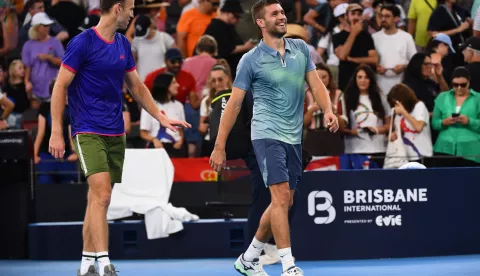 epa11800834 Michael Venus (R) of New Zealand and Nikola Mektic (L) of Croatia react after winning their doubles match against Novak Djokovic of Serbia and Nick Kyrgios of Australia at the Brisbane International tennis tournament in Queensland Tennis Centre in Brisbane, Australia, 01 January 2025. EPA/JONO SEARLE AUSTRALIA AND NEW ZEALAND OUT