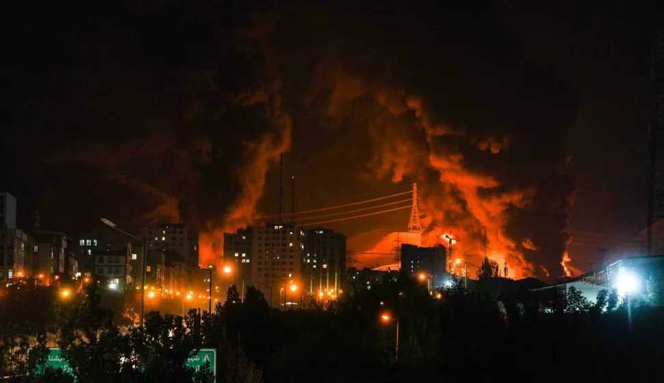 Fire and smoke rise into the sky after an Israeli attack on an oil depot in Tehran, Iran, at dawn on Sunday, June 15, 2025. Photo by Ahmad Hatefi /UPI Photo: Ahmad Hatefi/NEWSCOM